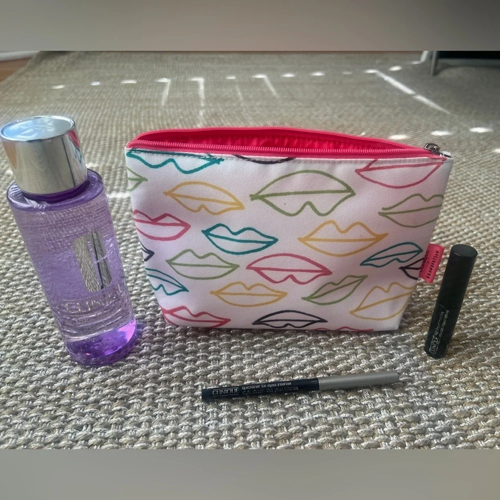Clinique cosmetic makeup collection - bag, mascara, eyeliner, and makeup remover